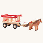 Ostheimer wooden hay-cart with red details on a plain background. The cart is attached to two horses with the horse harness.  