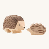 Ostheimer Hedgehogs woodnen toy figures on a plain background. 