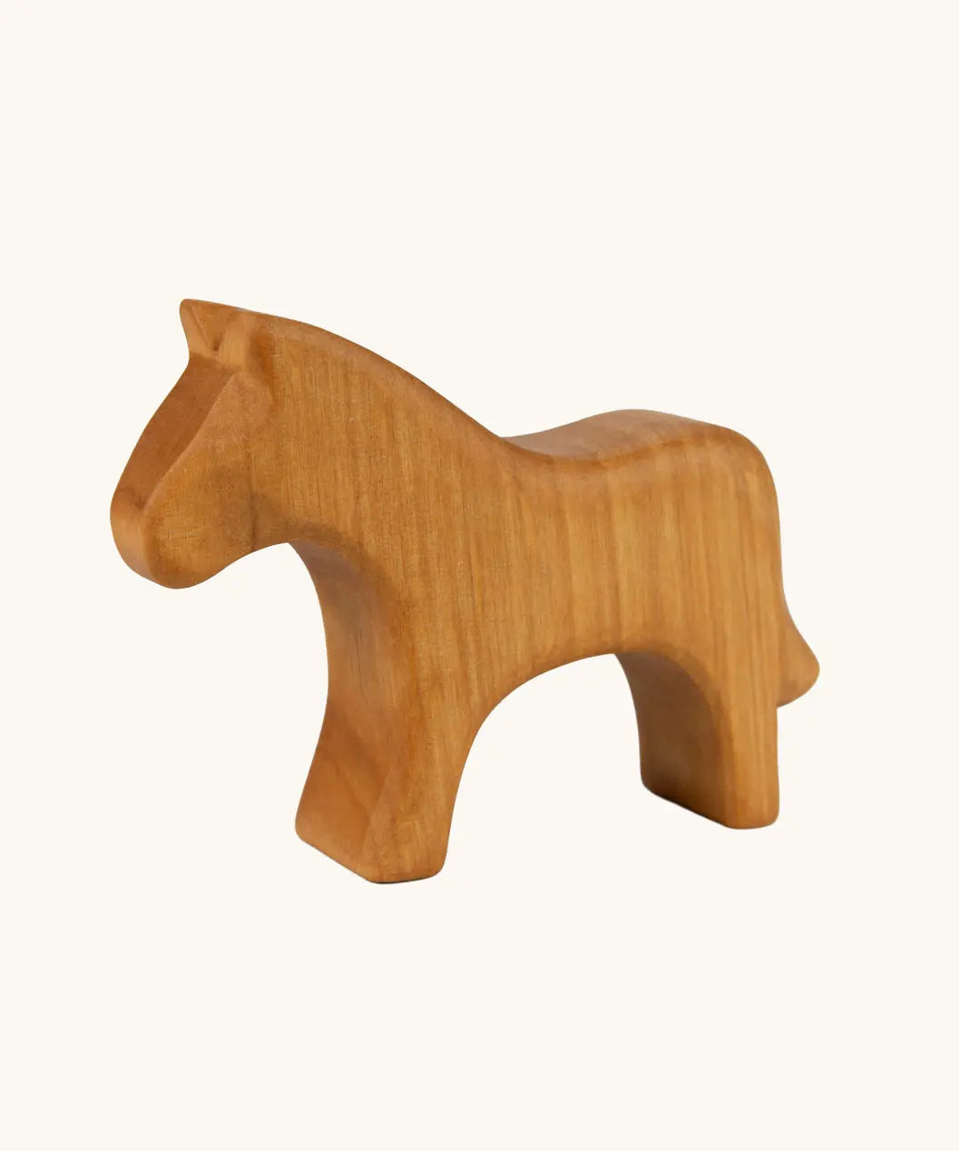 Ostheimer horse toy figure in a natural oiled wood showing the grain marks. 