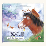 Ostheimer Hrokur and the Skyriders children's book. Showing a illustration of a horse and red squirrel  on the cover