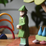 Ostheimer hunter wooden toy person figure placed in a small world play set up. 