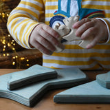 Child playing with Ostheimer polar bears and Ostheimer Ice Floe 4 Parts.