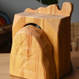 Back of the Ostheimer jailhouse wooden toy showing the carved details.