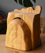 Back of the Ostheimer jailhouse wooden toy showing the carved details.