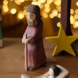 Ostheimer Joseph with staff handmade wooden toy figure in a small world play scene.