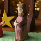 Ostheimer Joseph with staff handmade wooden toy figure in a small world play scene.