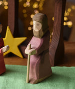 Ostheimer Joseph with staff handmade wooden toy figure in a small world play scene.
