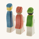 The back of the collection of three Ostheimer  King's Page Three Wise Men Wooden Nativity Figures in green, blue and red outfits. These wooden figures are part of a wide range of expertly hand crafted wooden toys here at Babipur. 