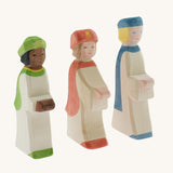 A collection of three Ostheimer  King's Page Three Wise Men Wooden Nativity Figures in green, blue and red outfits. These wooden figures are part of a wide range of expertly hand crafted wooden toys here at Babipur. 