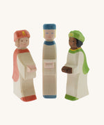 A collection of three Ostheimer  King's Page Three Wise Men Wooden Nativity Figures in green, blue and red outfits. These wooden figures are part of a wide range of expertly hand crafted wooden toys here at Babipur. 