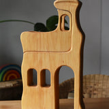 Ostheimer large wooden lookout tower wooden toy placed on a wooden surface.