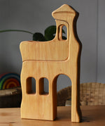 Ostheimer large wooden lookout tower wooden toy placed on a wooden surface.
