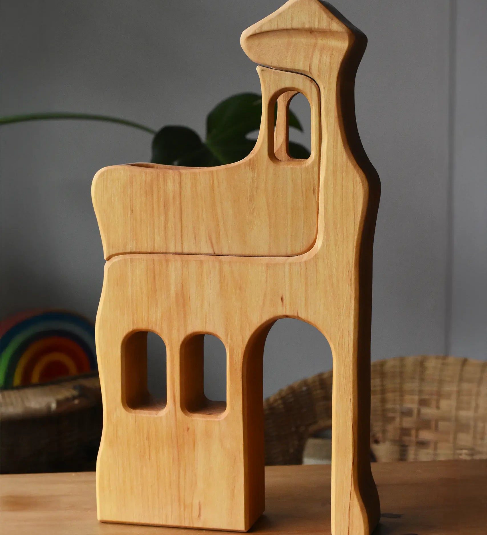 Ostheimer large wooden lookout tower wooden toy placed on a wooden surface.