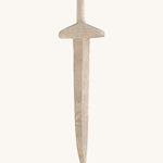 A long wooden sword on a cream background