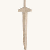 A long wooden sword on a cream background