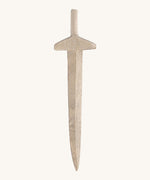 A long wooden sword on a cream background