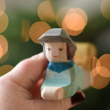 A close up of the face of the Ostheimer lying shepherd wooden toy figure. These wooden figures are part of a wide range of expertly hand crafted wooden toys here at Babipur. 