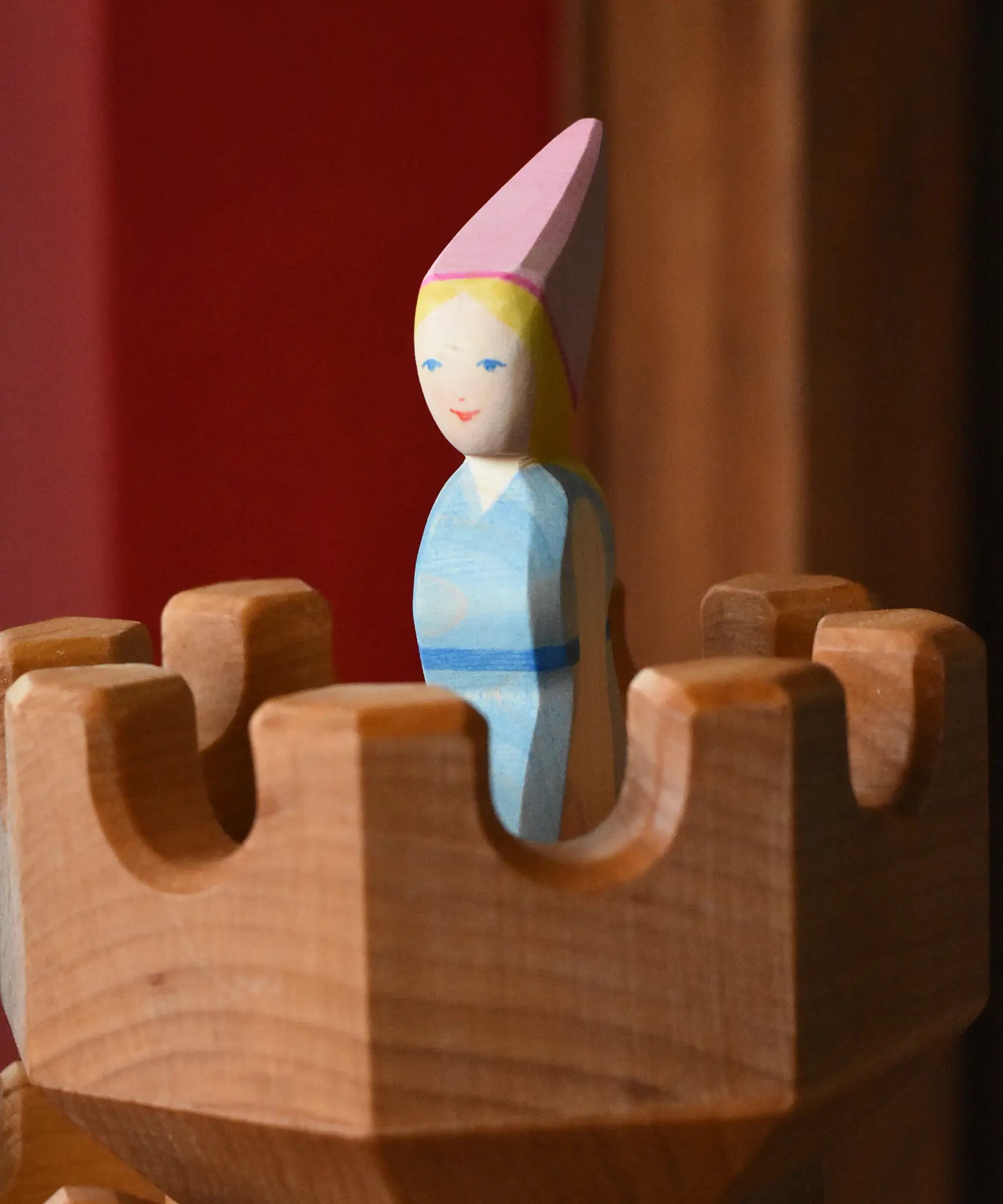 Close up of the Ostheimer medieval princess placed in the top of the round tower castle pieces. 