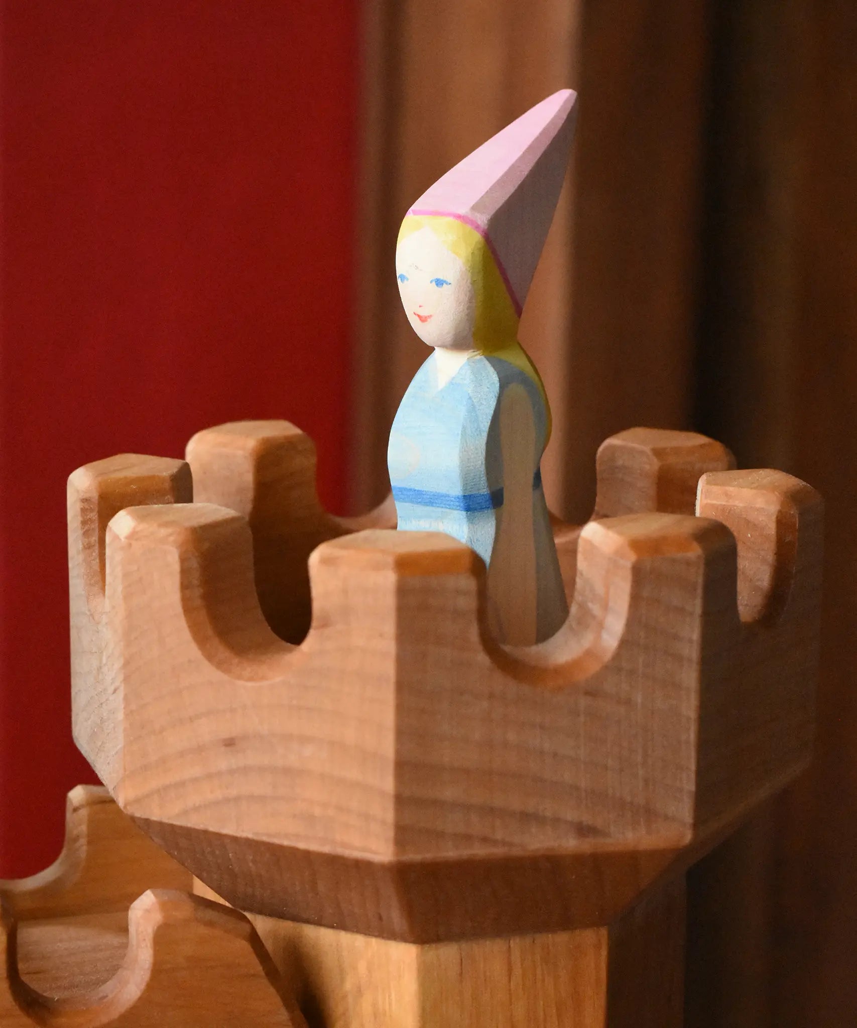 Close up of the Ostheimer medieval princess placed in the top of the round tower castle pieces. 