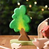 A medium Ostheimer oak tree with support placed in the middle of a small world play scene. These wooden figures are part of a wide range of expertly hand crafted wooden toys here at Babipur.