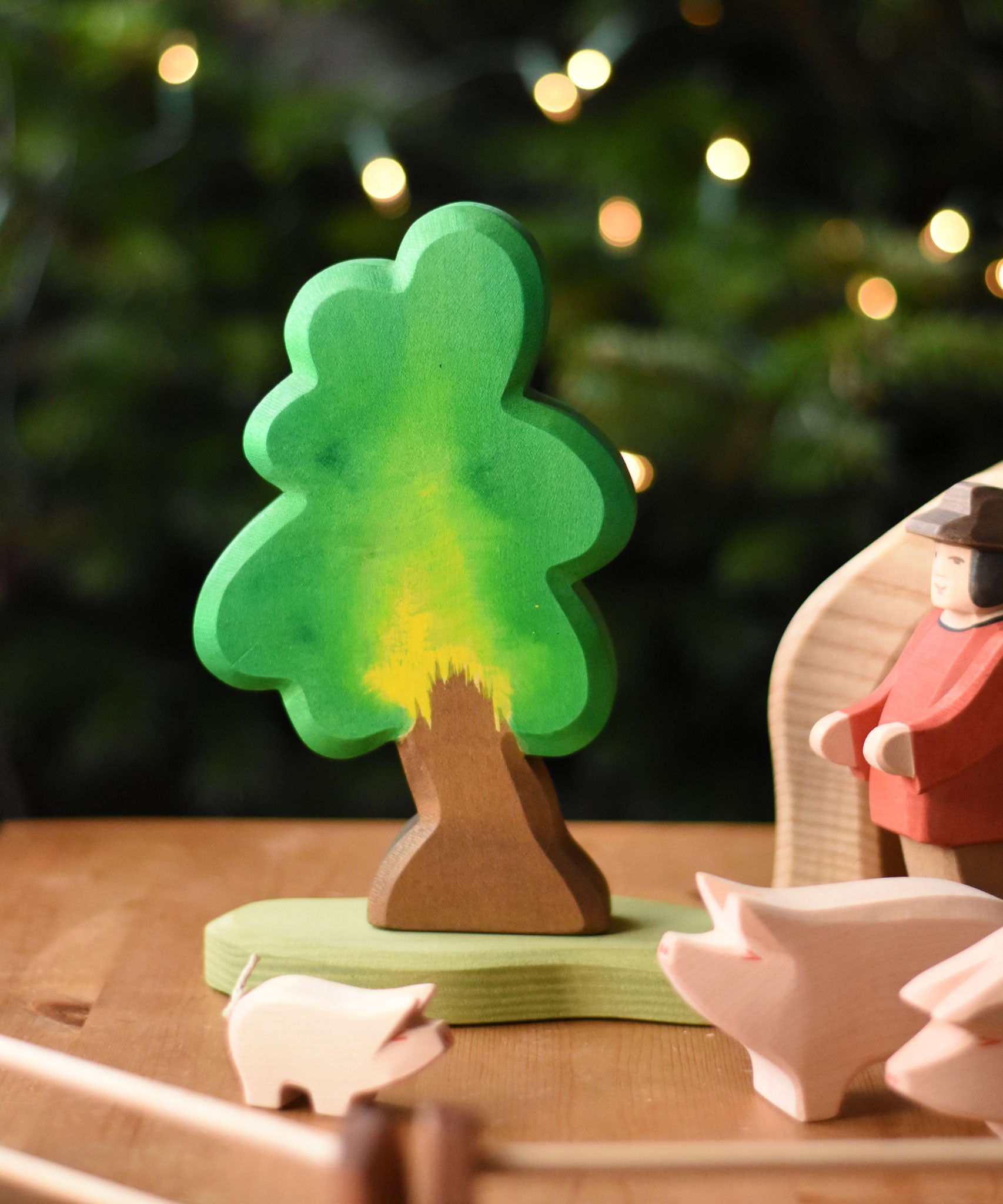 A medium Ostheimer oak tree with support placed in the middle of a small world play scene. These wooden figures are part of a wide range of expertly hand crafted wooden toys here at Babipur.