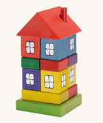 Ostheimer Multi Coloured Block House wooden toy on a plain background. 