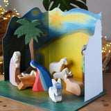 Ostheimer wooden toy nativity set with cardboard diorama scene. 