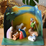Ostheimer wooden toy nativity set with cardboard diorama scene. 