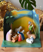Ostheimer wooden toy nativity set with cardboard diorama scene. 