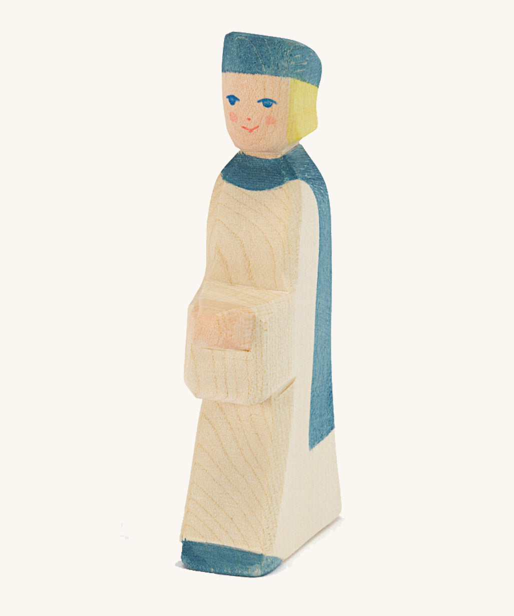 Ostheimer Blue King’s Page wooden nativity figure, a Waldorf inspired Star Singer with white skin and blond hair, wearing a white robe with a blue cloak and blue hat, hand painted 