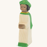 Ostheimer Green King’s Page wooden nativity figure, a Waldorf inspired Star Singer with black skin and black hair, wearing a white robe with a green cloak and green hat, hand painted 