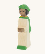 Ostheimer Green King’s Page wooden nativity figure, a Waldorf inspired Star Singer with black skin and black hair, wearing a white robe with a green cloak and green hat, hand painted 