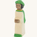 Ostheimer Green King’s Page wooden nativity figure, a Waldorf inspired Star Singer with black skin and black hair, wearing a white robe with a green cloak and green hat, hand painted 