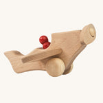 Ostheimer Natural Open Plane With 1 red Person on a plain background. 