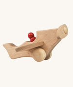 Ostheimer Natural Open Plane With 1 red Person on a plain background. 