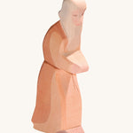 Ostheimer wooden Noah figure toy on a plain background. 