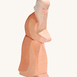Ostheimer wooden Noah figure toy on a plain background. 