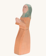 Ostheimer Noah's Wife wooden toy figure on a plain background. 