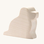 Ostheimer paint your own dog figure on a plain background. A natural, unpainted wooden figure ready for you to decorate yourself. 