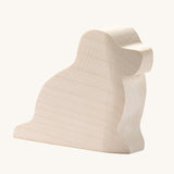 Ostheimer paint your own dog figure on a plain background. A natural, unpainted wooden figure ready for you to decorate yourself. 