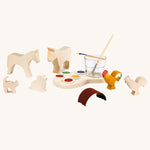 Ostheimer paint-your-own-figures creative set on a plain background. 