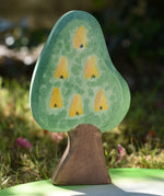 Ostheimer wooden golden pear tree shown on the golden pear fruit side on a pond scenery piece.