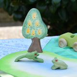 Ostheimer wooden golden pear tree scenery piece used in a small world play set up with a pond piece and frogs. 