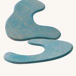 Ostheimer blue Pond Plates wooden toys on a plain background. 