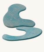 Ostheimer blue Pond Plates wooden toys on a plain background. 