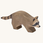 Ostheimer Running Raccoon wooden toy figure on a plain background.