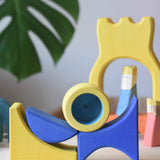 Yellow and blue blocks from the Ostheimer Rainbow Castle Block set stacked up.