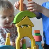Ostheimer Rainbow Castle Blocks being stacked by a child.