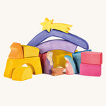 The blocks from the Ostheimer Rainbow Nativity Blocks set, set up in a festive nativity play scene. 