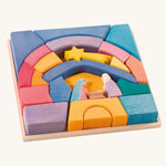 The Ostheimer Rainbow Nativity Block set in the wooden frame they come with on a plain background.